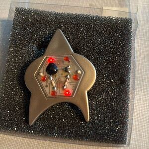 Star Trek pin. Lights up.